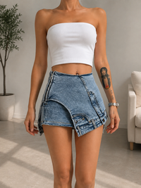 PANTALONES VAQUEROS CORTOS DE CORTE IRREGULAR